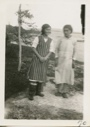 Image of Two Eskimos [Inuit] at School, helpers